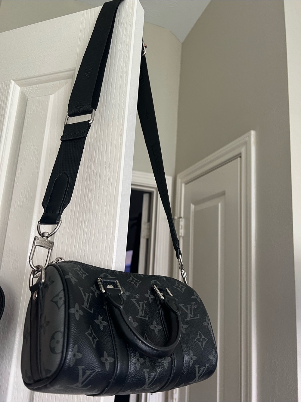 Louis Vuitton Black Leather Crossbody Bag (9” L x 5” H)